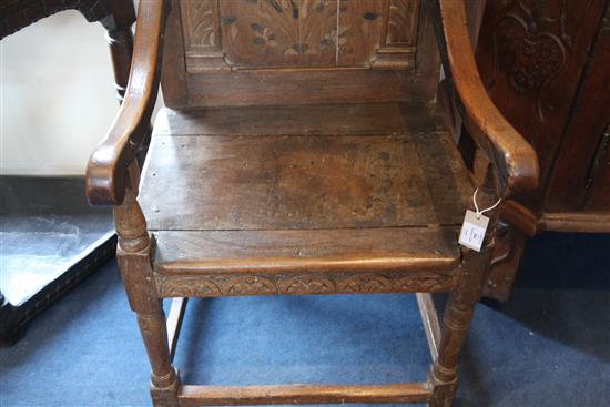 A 17th century oak Wainscot chair, W.2ft 2in. H.3ft 8in. incorporating later timbers